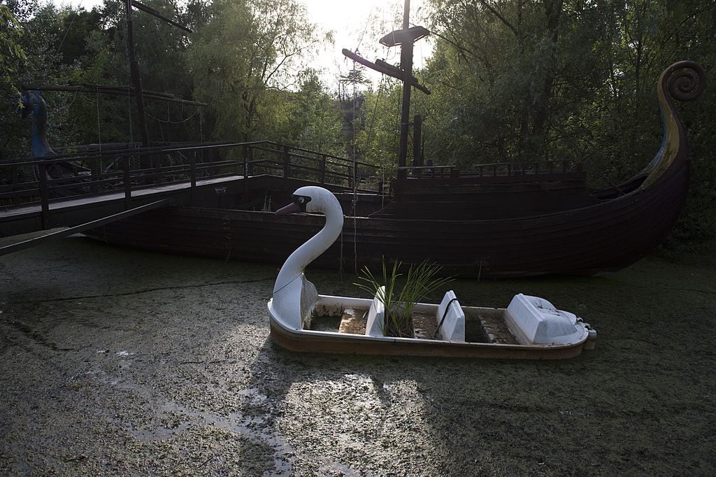 View of the pirate ship and a swan boat in the former Spreepark amusement park. Photo: John MacDougall/AFP via Getty Images.