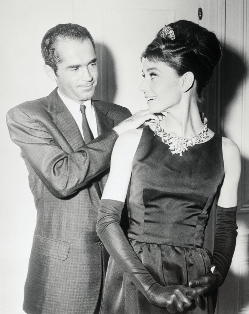 Henry B Platt, great-grandson of the founder of Tiffany’s, adjusts the Jean Schlumberger necklace set with the 128-carat Tiffany Diamond for Audrey Hepburn. Photo courtesy Getty Images.