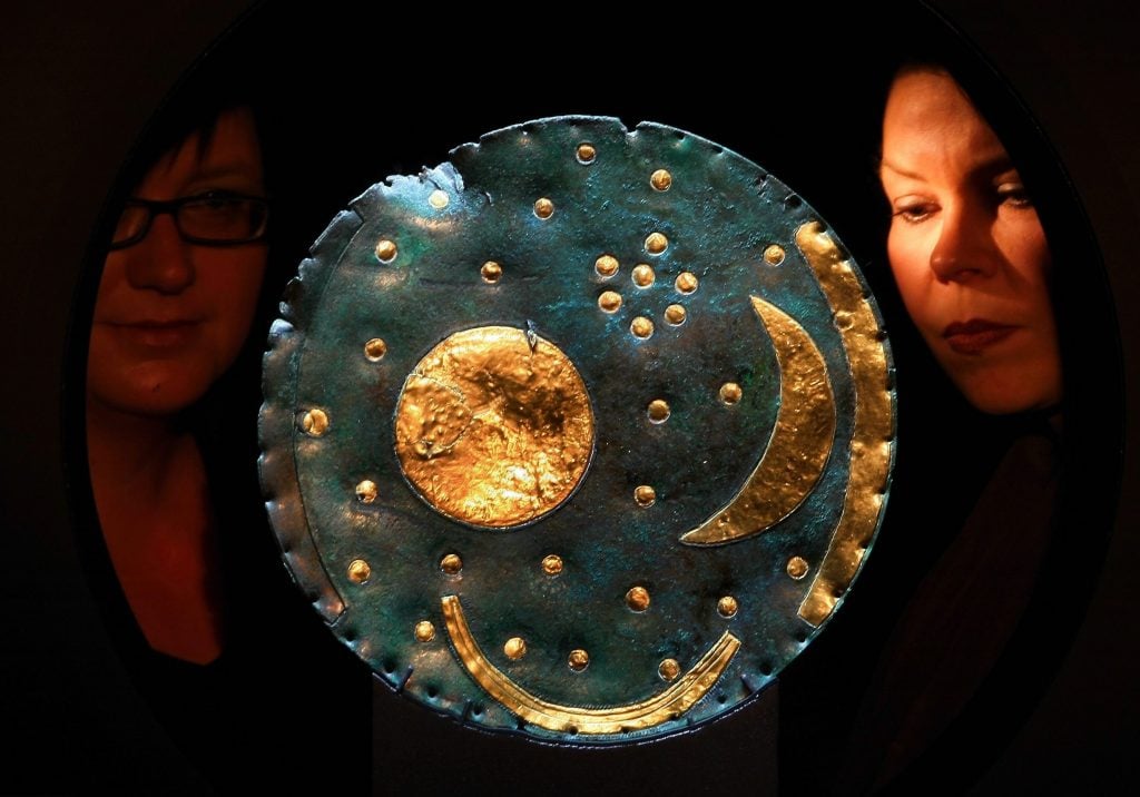 The Nebra Sky Disk on viewe at the State Museum for Prehistory in Halle, Germany. Photo by Schellhorn/ullstein bild via Getty Images.