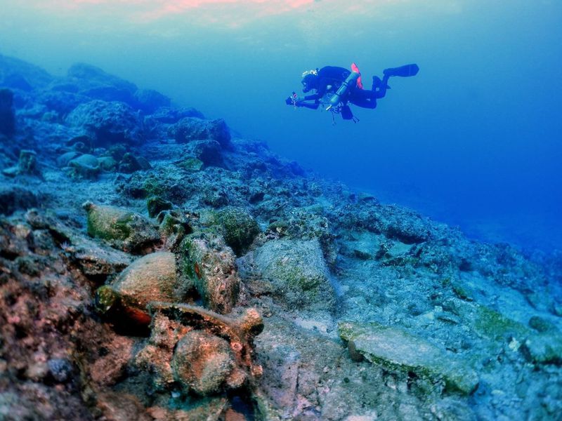 Archaeologists discovered ancient amphorae from Spain and what is now Tunisia in a shipwreck off the Greek island of Kasos. Photo by Nikos Koukoulas, courtesy of the Kasos Maritime Archaeological Project and the Greek Ministry of Culture and Sports.
