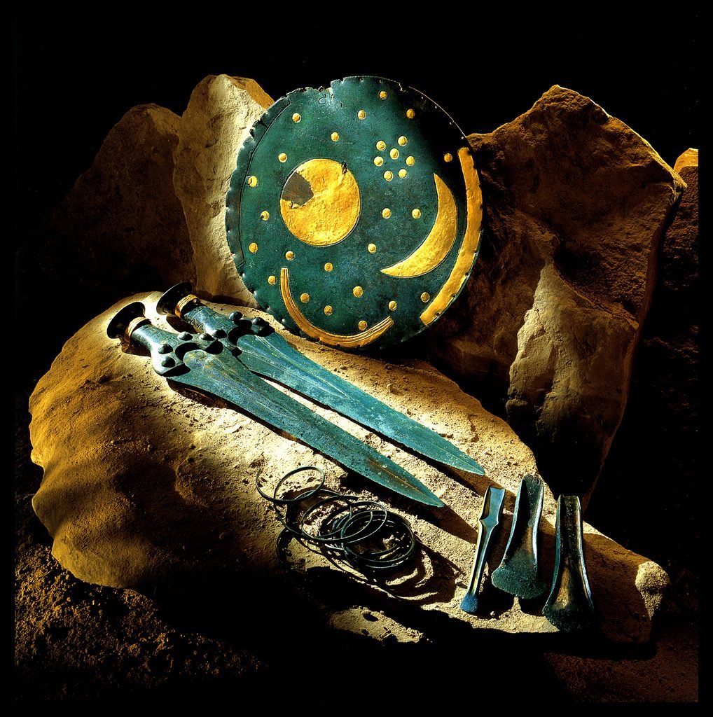 The controversial Nebra Sky Disk and some of the Bronze Age artifacts with which it was found. Photo courtesy of the State Museum for Prehistory in Halle, Germany.