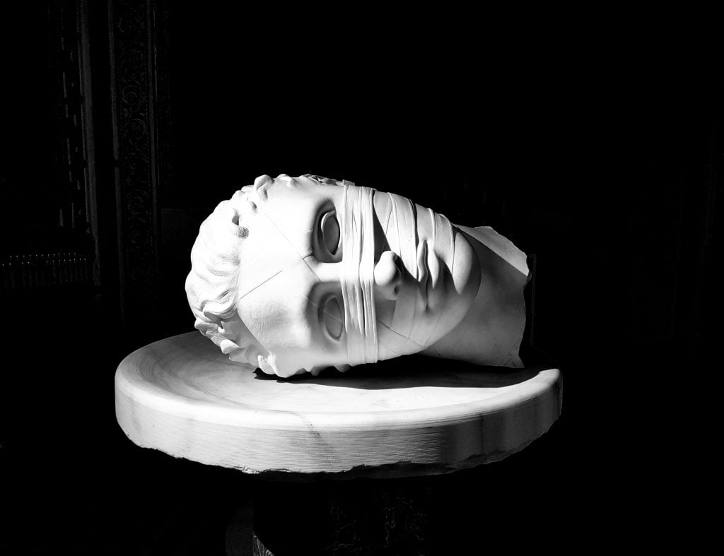Sculpture of the bandaged, severed head of St. John the Baptist in the Santa Maria degli Angeli e dei Martiri, Baths of Diocletian, Rome. Photograph by Peter Chiykowski.