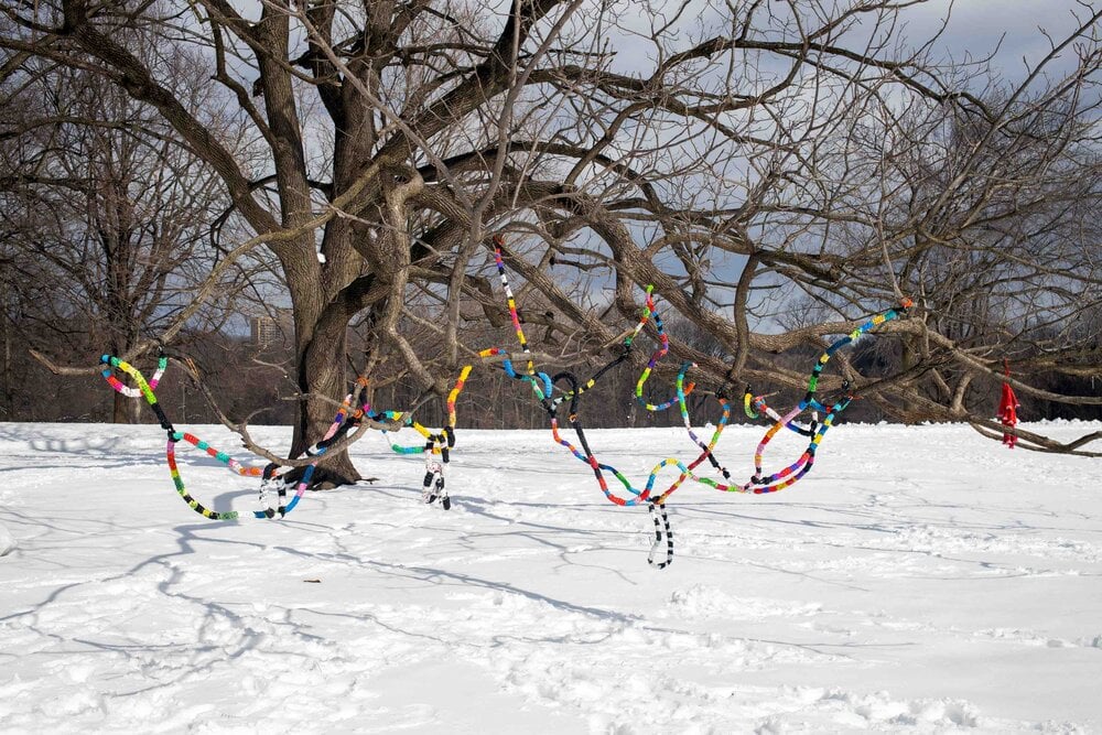 A crocheted sculpture by Antonia Perez in "ADULT SLEDDING," Good Naked's pop-up show in Prospect Park. Photo by Alexa Hoyer, courtesy of Good Naked. 