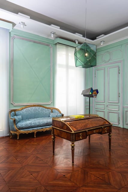 Installation view at Kramer Gallery with Olafur Eliasson's Youth (2019) and Your Vanishing (2011) paired with a Louis XVI desk stamped by P.Pioniez and a Louis XV giltwood sofa stamped by J-J.Pothier.
