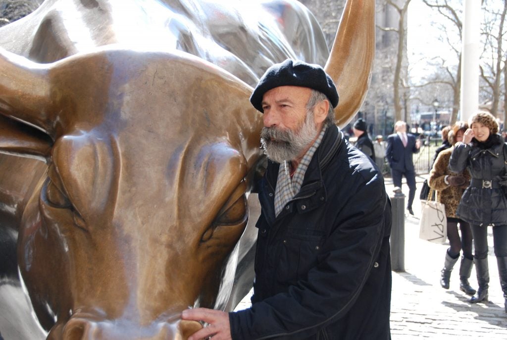 Arturo Di Modica with Charging Bull. Photo by Arthur Piccolo.
