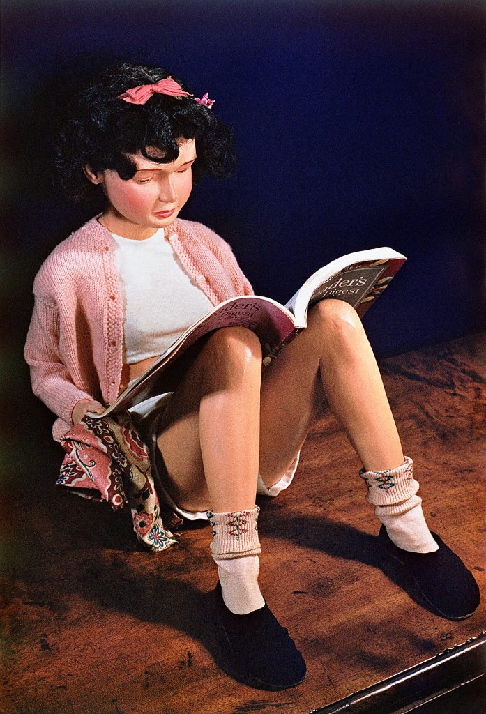 Morton Bartlett, <i>Untitled (Girl Reading)</i> (2006). (Original c. 1955.) Photo courtesy of The Bartlett Project, LLC. © The Bartlett Project, LLC.
