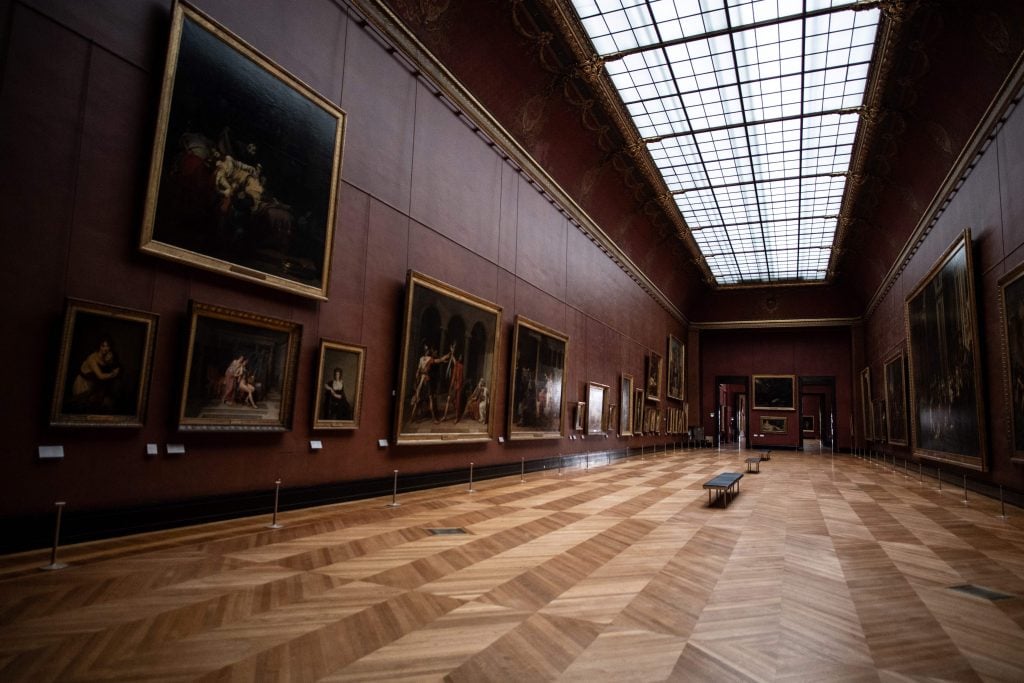 The eerily empty "Salle Mollien" (Mollien room), Photo by MARTIN BUREAU/AFP via Getty Images.
