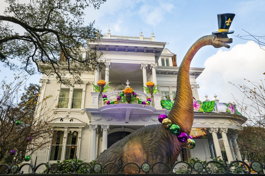 A Mardi Gras house float with a dinosaur in New Orleans. Photo by Erika Goldring/Getty Images.