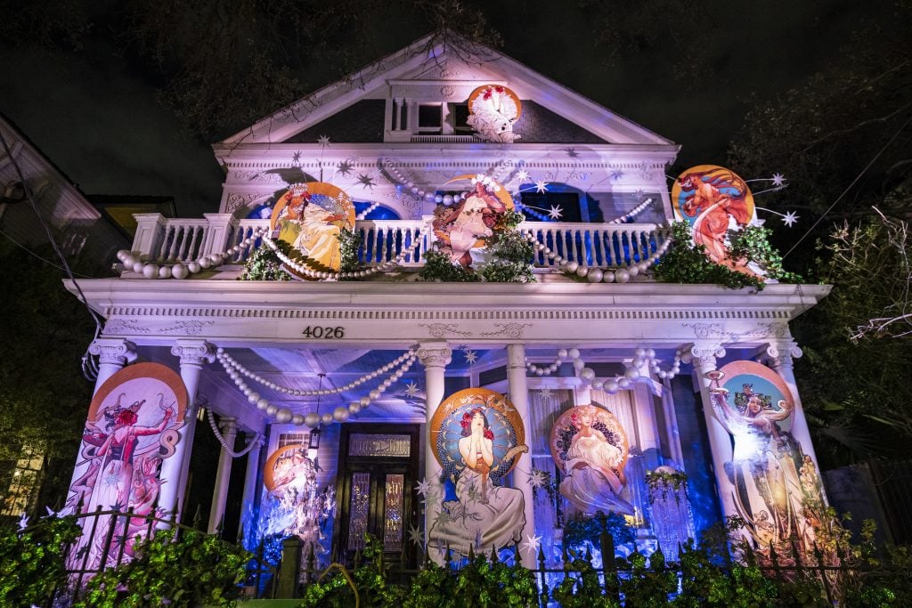 The Krewe of Muses Cosmos House is decorated with the nine Muses for a Mardi Gras house float in New Orleans. Photo by Erika Goldring/Getty Images.