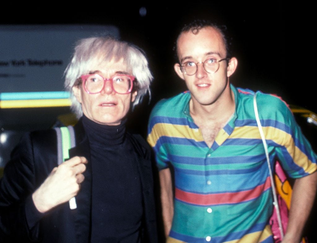 Andy Warhol and Keith Haring attend Mick Jagger's 42nd Birthday Party on July 26, 1985, at the Palladium in New York City. Photo by Ron Galella, Ltd./Ron Galella Collection via Getty Images.