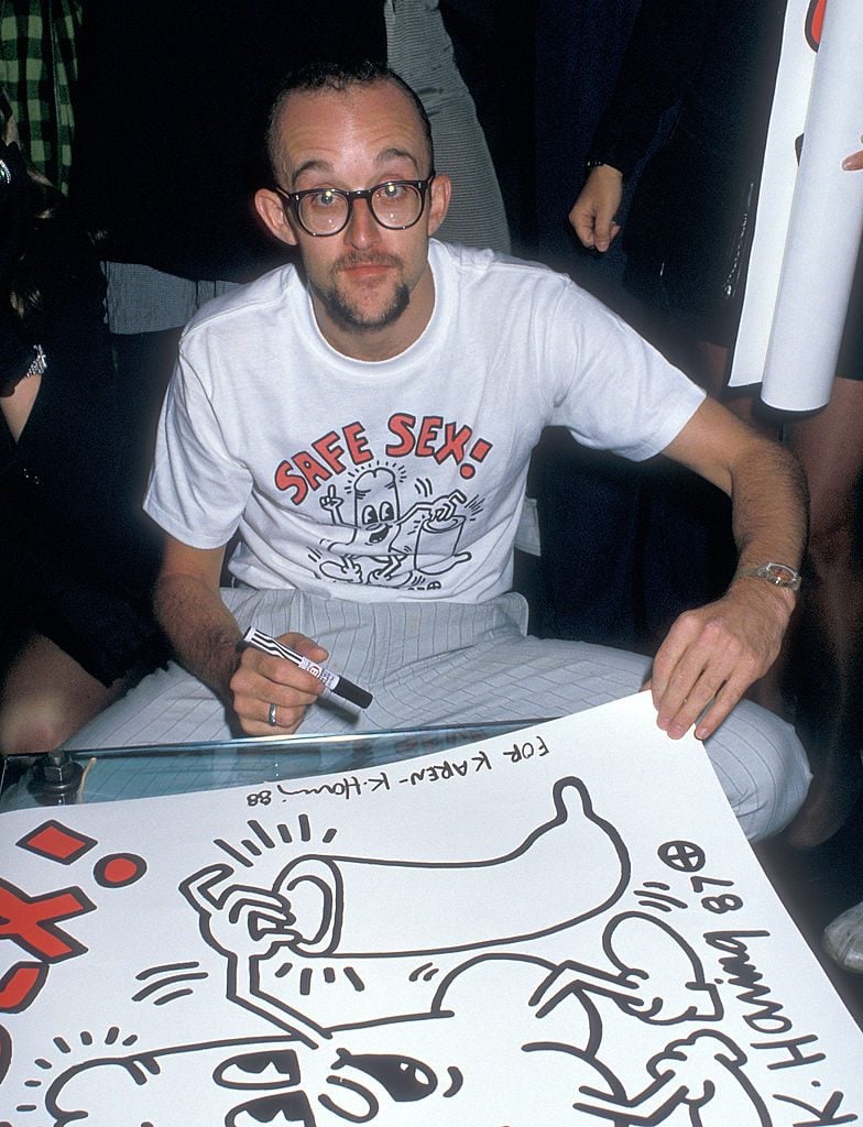 Keith Haring attends the Party to Celebrate Alyson Books' Publication of "You Can Do Something About AIDS" to Benefit HIV/AIDS Research on June 13, 1988 at Club MK in New York City. Photo by Ron Galella/Ron Galella Collection via Getty Images.