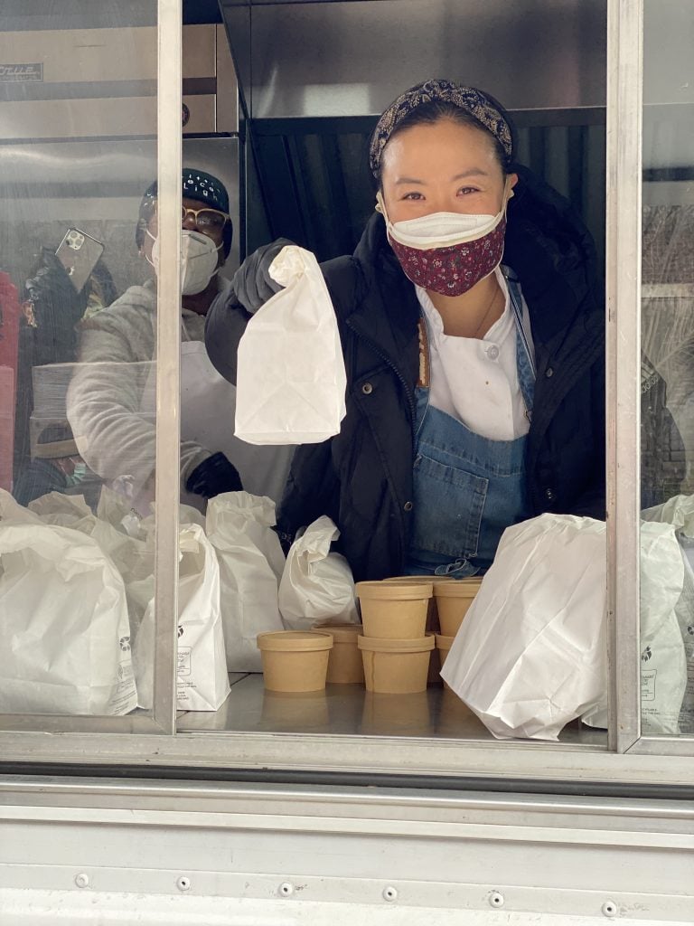 Chef Jae Jung serving gumbo with the Wide Awakes Mobile Soup Kitchen. Photo courtesy of the Wide Awakes Mobile Soup Kitchen.