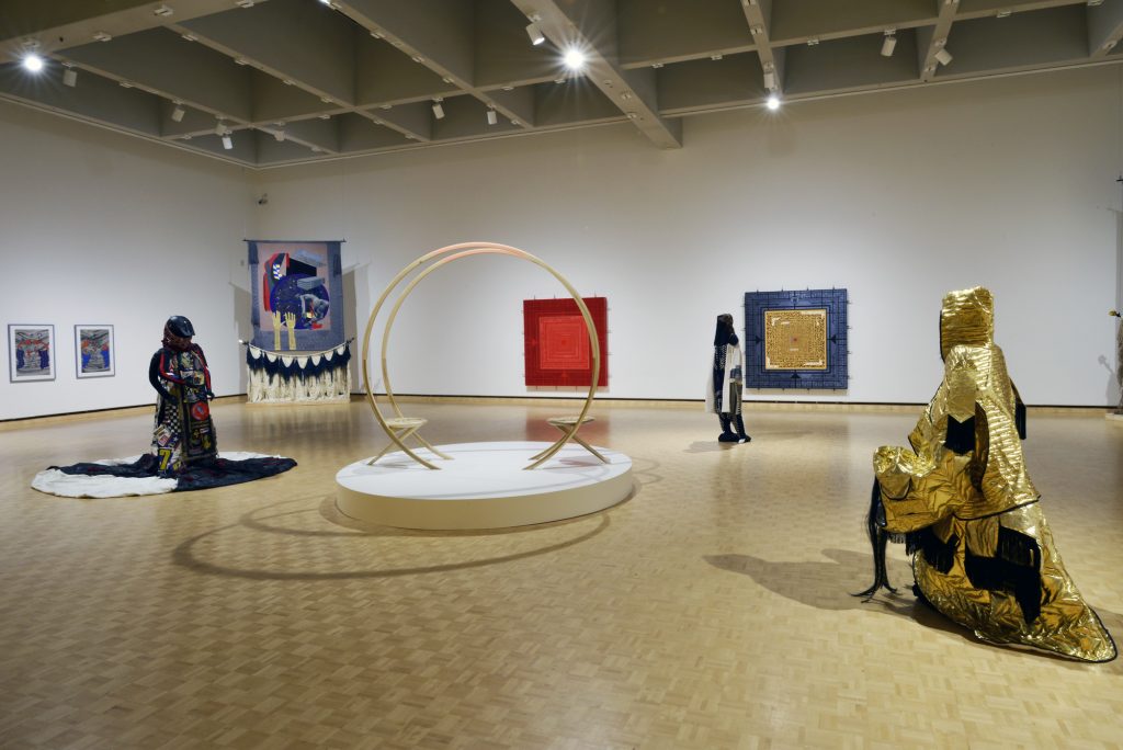Installation view of Rajni Perera and Nep Sidhu's "Banners for New Empires" at MacKenzie Art Gallery, 2019. Photo: Don Hall.