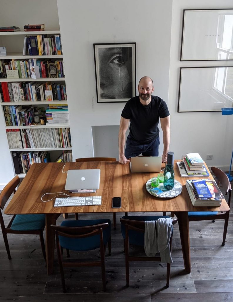 Richard Scott, Founder and CEO of PR consultancy Scott & Co, at his home dining table-turned-office.
