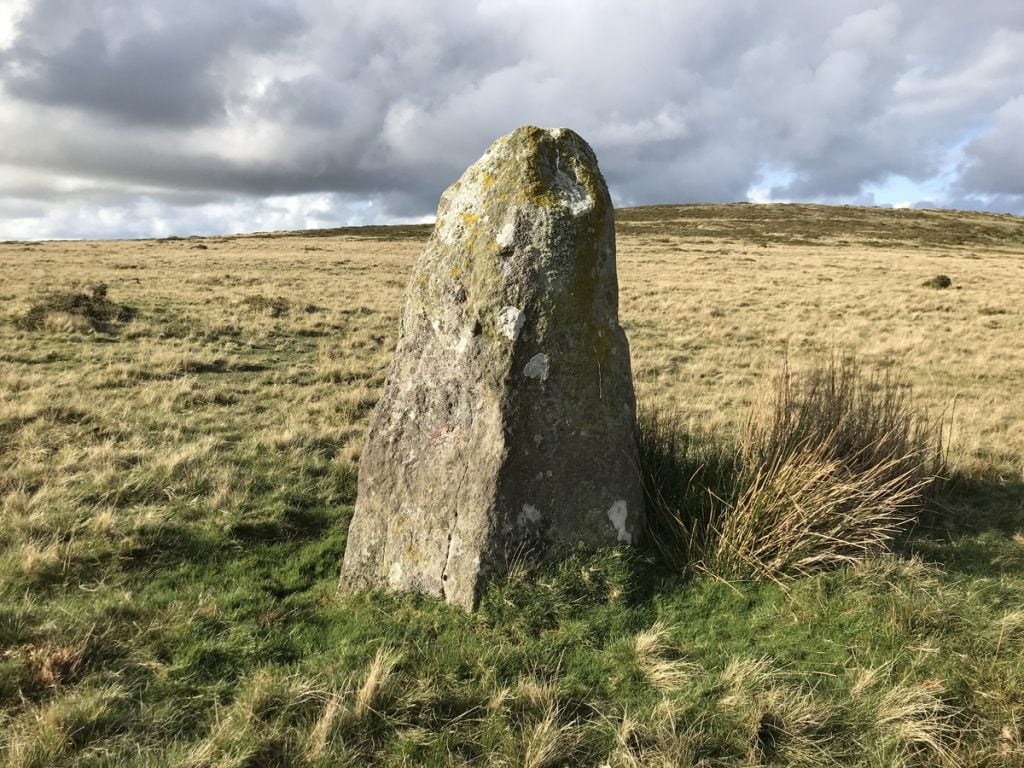 This standing stone at Waun Mawn in Wales is now believed to be among the remnants of an ancient stone circle that was deconstructed and used in the building of Stonehenge. Photo by Paul R. Davis, courtesy of the Royal Commission on the Ancient and Historical Monuments of Wales.