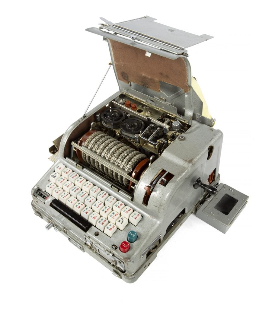 An original Soviet KGB Fialka (M-125-3M) or "Violet" cipher machine used during the Cold War to code and decode secret messages. Accompanied by an updated manual. Courtesy Julien's Auctions.