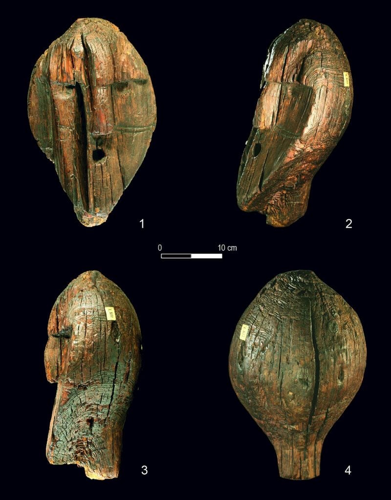 Head of the Shigir Idol, the world's oldest wood sculpture, discovered in a Russian peat bog in 1890. Photo courtesy of the Sverdlovsk Regional Museum.
