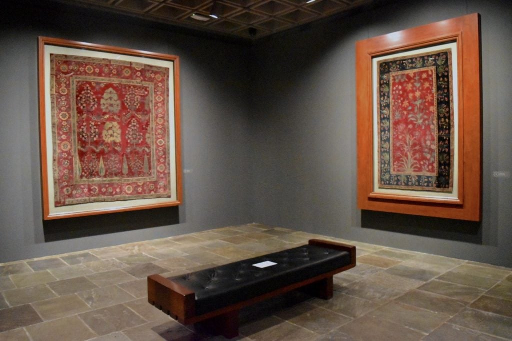  The Indian Mughal Carpets Gallery with <em>Carpet with Flowers</em> and <em>Carpet with Trees</em>, both from Northern India, at the Frick Madison. Photo by Ben Davis.