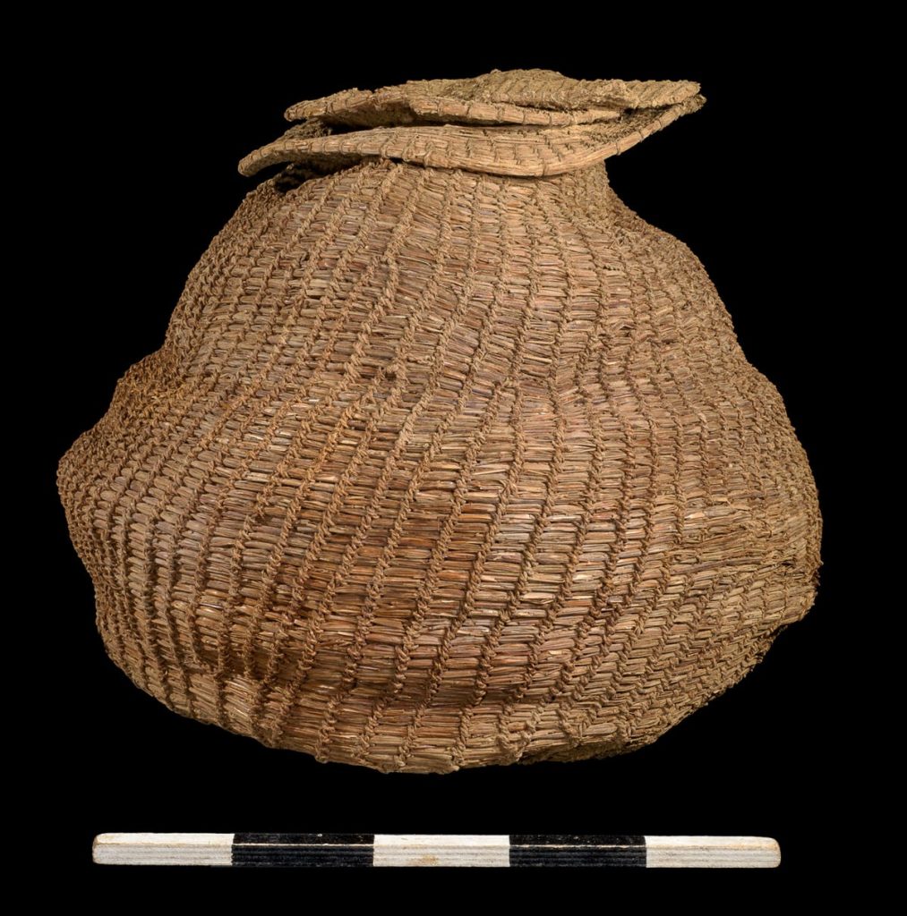 A 10,500-year-old basket with lid. Photo by Guy Fitoussi, courtesy of the Israel Antiquities Authority.
