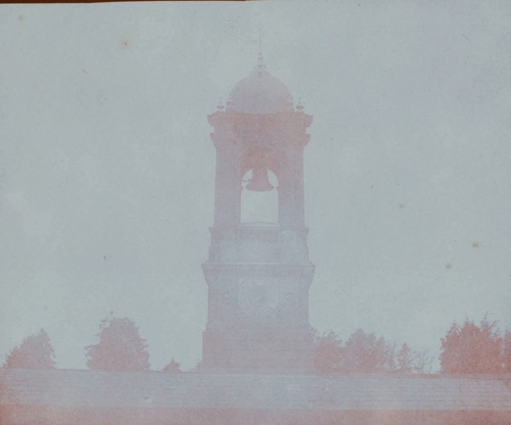 William Henry Fox Talbot, Bell tower at Bowood House with clock showing the time at 2:30 p.m., possibly a five minute exposure (1842). Photo courtesy of Sotheby's New York and London. 