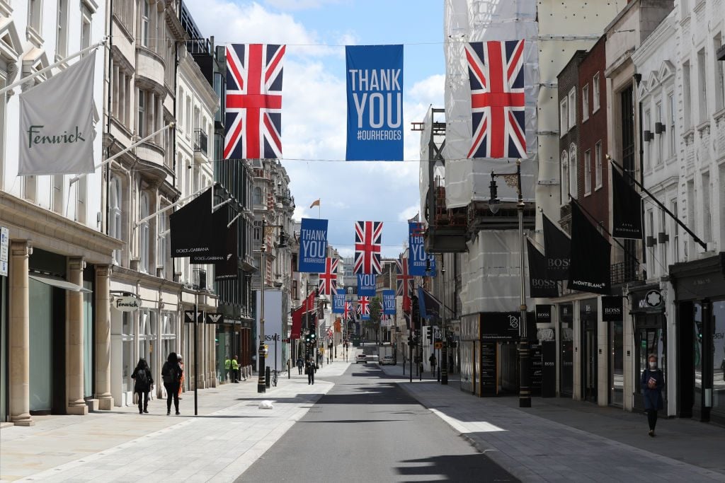 Banners thanking the NHS on display in New Bond Street, Mayfair, London. Photo by Jonathan Brady/PA Images via Getty Images.