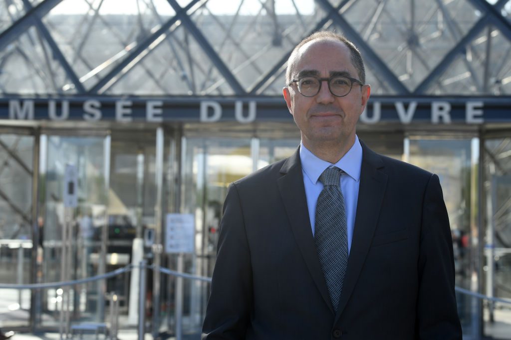 President-Director of the Louvre museum, Jean-Luc Martinez, stands outside the museum as it reopens after a 16-week closure. (Photo by Pascal Le Segretain/Getty Images)