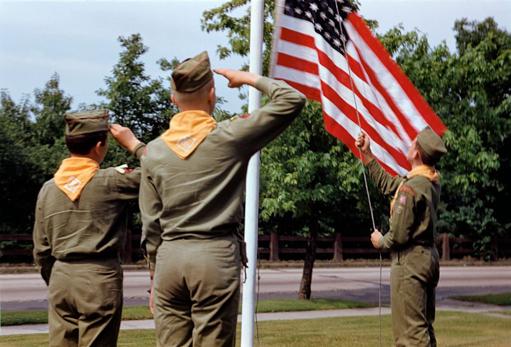 Boy Scouts saluting the American flag. Photo by William Gottlieb/Corbis via Getty Images.