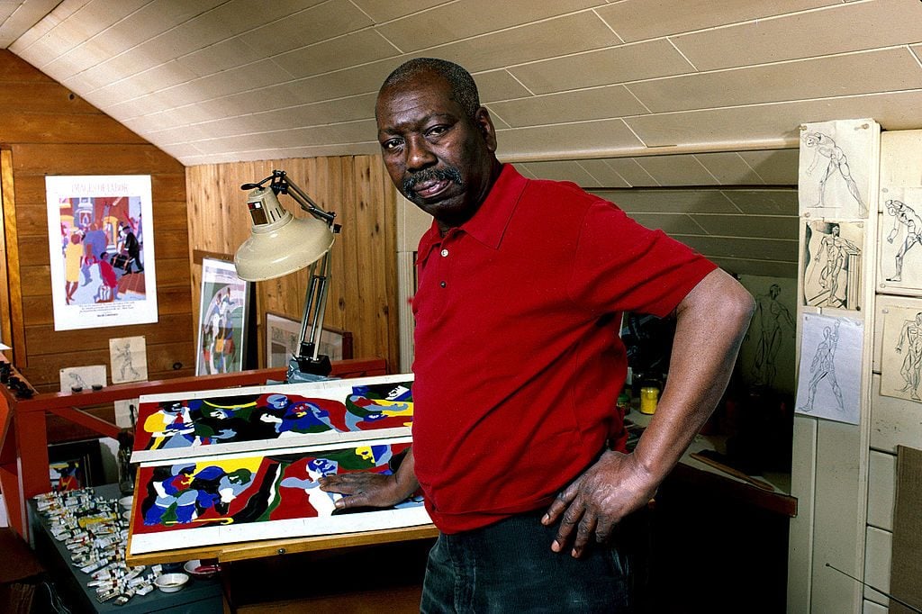 Jacob Lawrence poses in his studio, Seattle, Washington, December 1, 1989. Photo by George Rose/Getty Images.