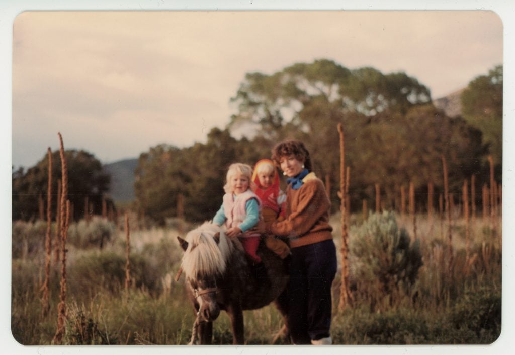 The author as a child on a horse with her mother. Courtesy of Christina Lonsdale.