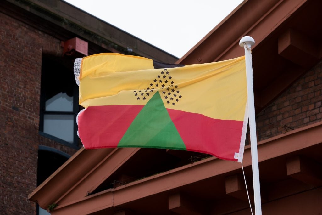 Larry Achiampong, <i>Pan African Flag for the Relic Travellers' Alliance</i> (2021). Installation view at Dr Martin Luther King Jr. building. Photo by Mark McNulty.