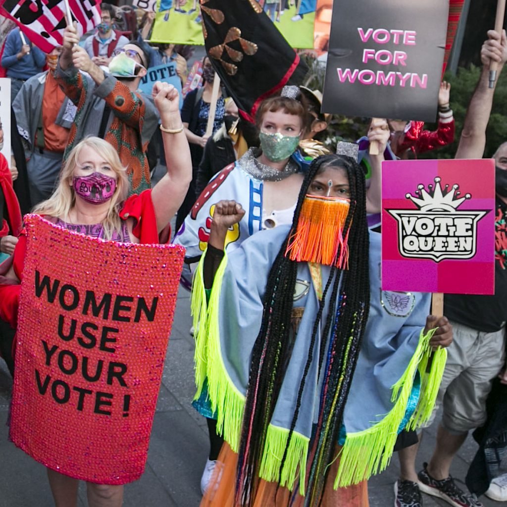 Michele Pred Bud Snow and Wildcat Ebony Brown at the Wide Awakes Vote Feminist Parade in New York. Photo by Pontus Hook.