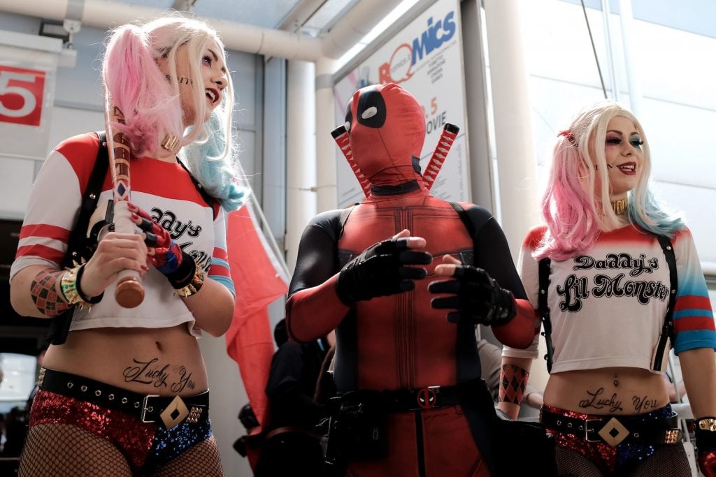 Cosplay enthusiasts dressed up as Harley Quinn and Deadpool at the Romics event, on April 8, 2017. Photo by Alberto Pizzoli/AFP via Getty Images.