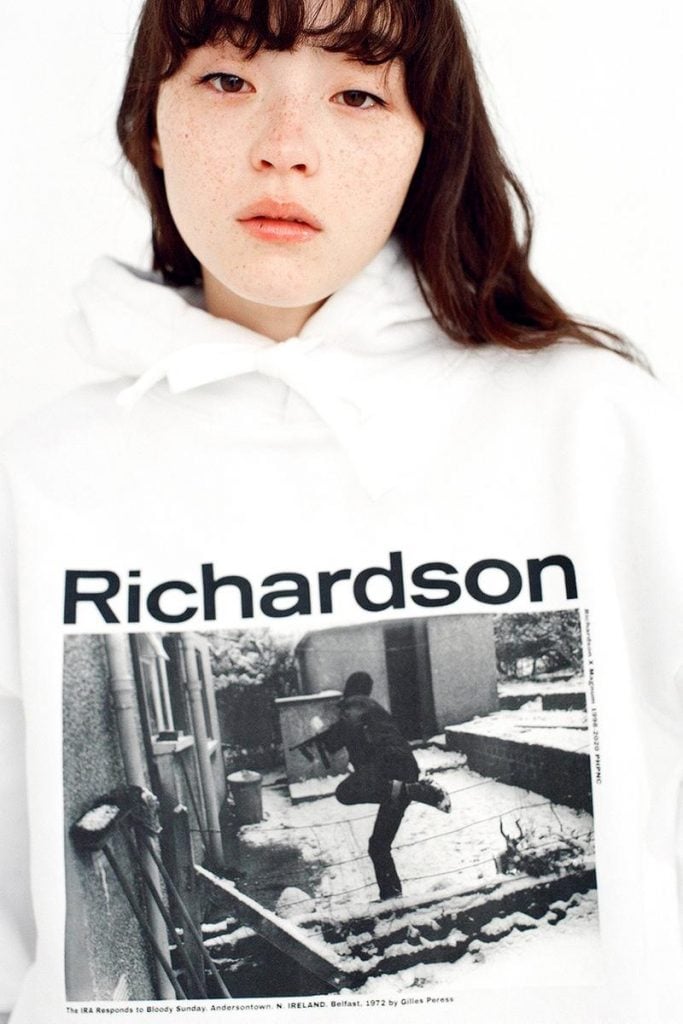 A Richardson sweatshirt featuring Gilles Peress's photograph The IRA response to Bloody Sunday, Andersontown, N. IRELAND, Belfast, 1972.