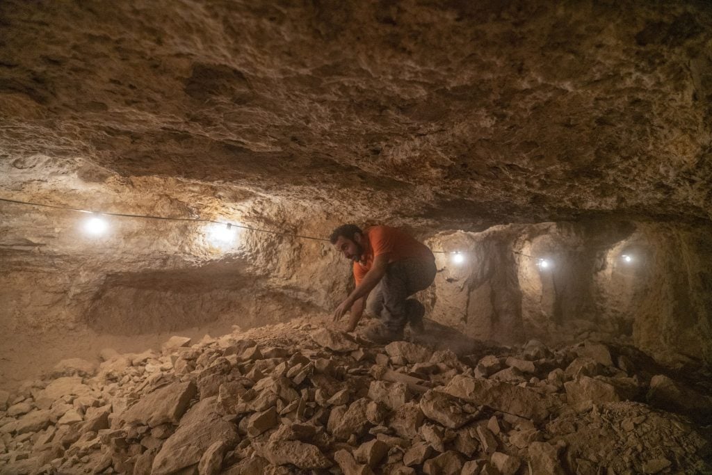 The excavation of the caves. Photo by Yoli Schwartz, courtesy of the Israel Antiquities Authority.