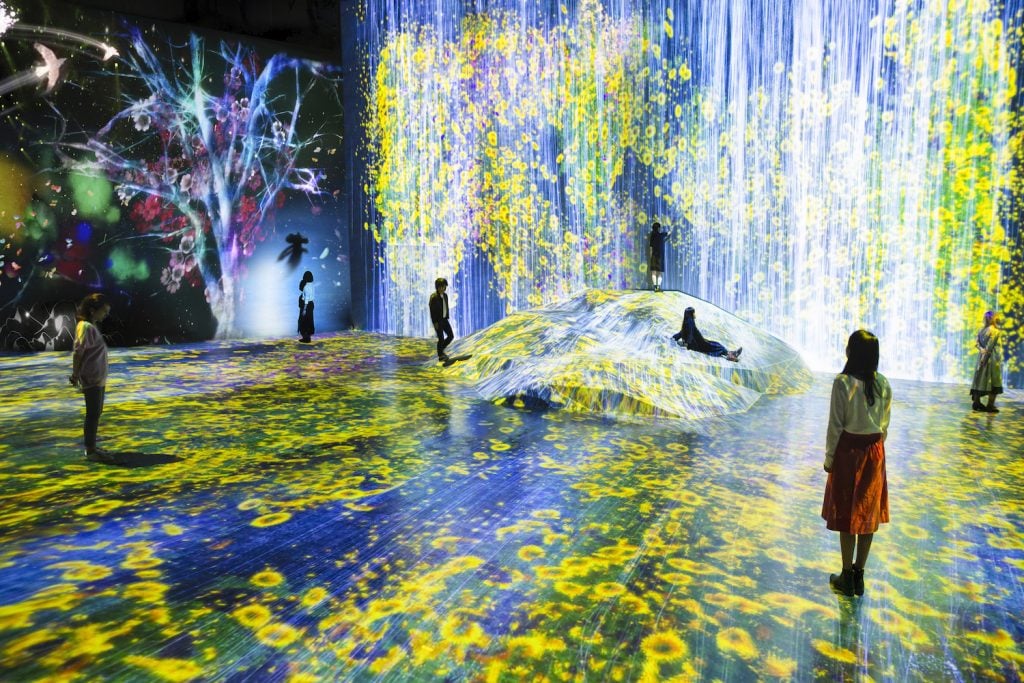 teamLab, <i>Universe of Water Particles on a Rock where People Gather</i> (2018). Installation at Mori Building Digital Art Museum, teamLab “Borderless.” Courtesy of teamLab and Pace Gallery.