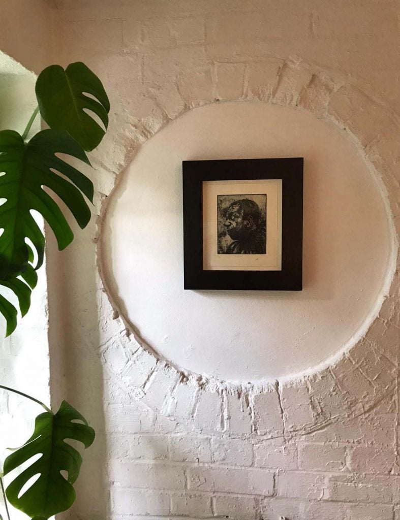 Lynette Yiadom Boakye's 2012 etching, Siskin installed in Chisenhale Gallery director Zoé Whitley's office. Courtesy Zoé Whitley.