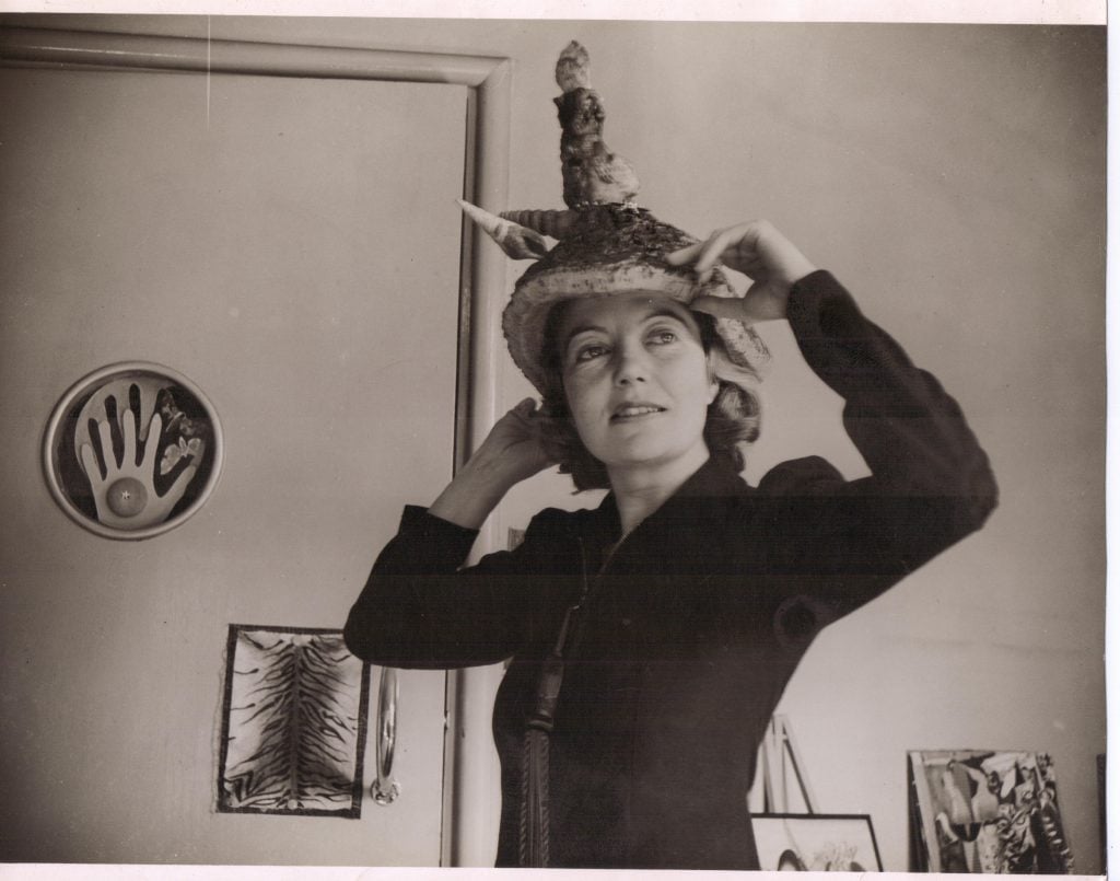 Eileen Agar wearing a "Ceremonial Hat for Eating Bouillabaisse." The picture was taken in 1936. © The estate of Eileen Agar.