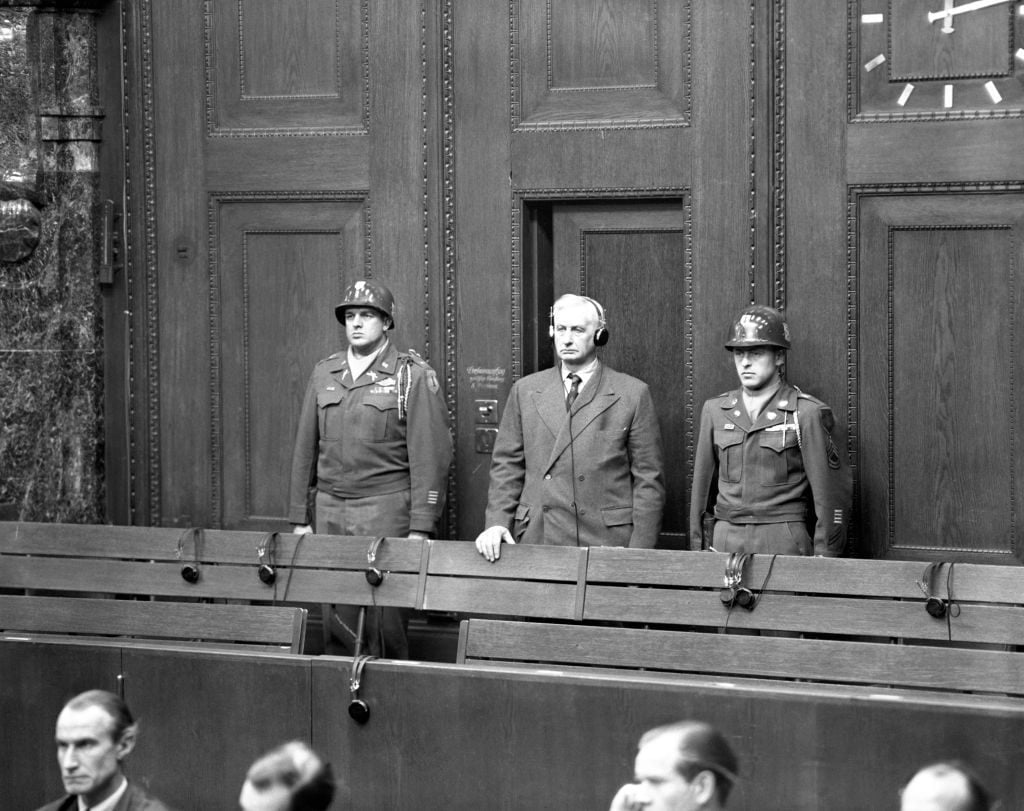 Convicted Nazi war criminal Friedrich Flick at his sentencing in 1947. He was sentenced to seven years in prison. After having served a prison sentence, Flick became successful again in the late 1950s and was one of the richest citizens of West Germany. Photo: dpa/picture alliance via Getty Images.