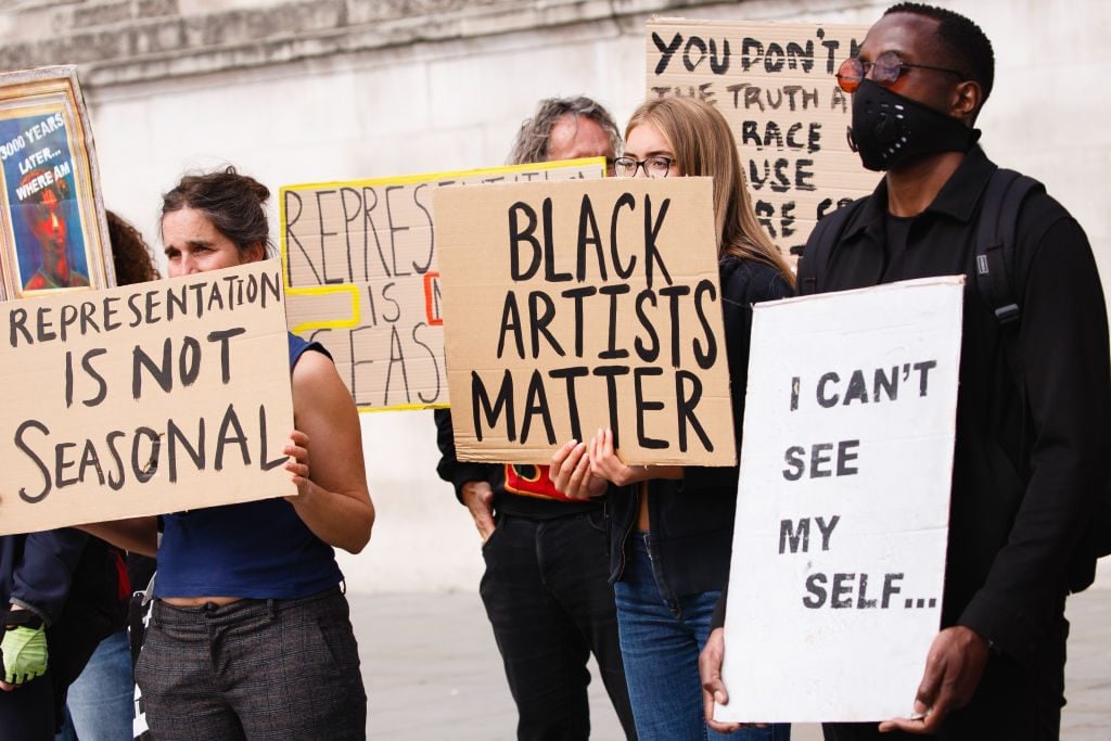 Black Lives Matter activists calling for equal representation for the works of black artists in British museums, galleries and national institutions. Photo by David Cliff/NurPhoto via Getty Images.