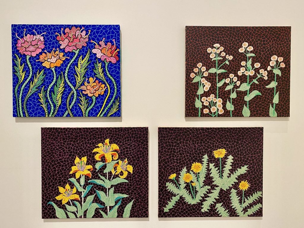 Yayoi Kusama, Summer Flowers (1988), Wild Flowers (1984), Lilies (1984), and Dandelions (1984) at the New York Botanical Garden. Photo by Sarah Cascone.