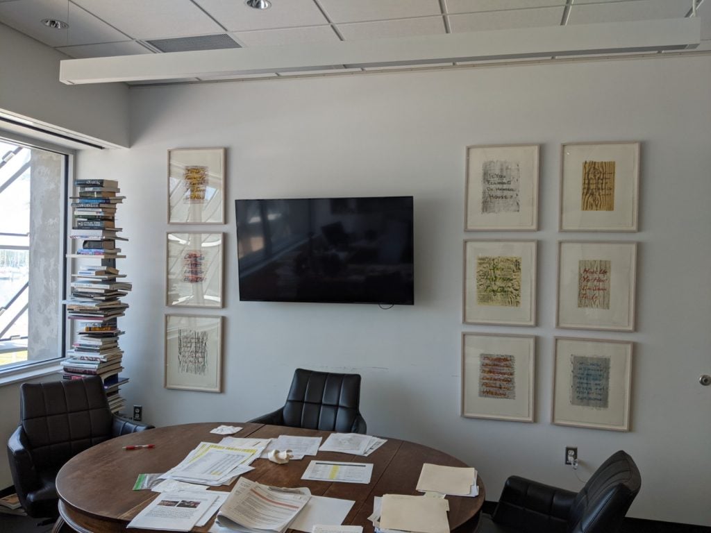 Interior view of Hank Hine's office at The Dalí Museum with works by Graciela Iturbide and Ed Ruscha.