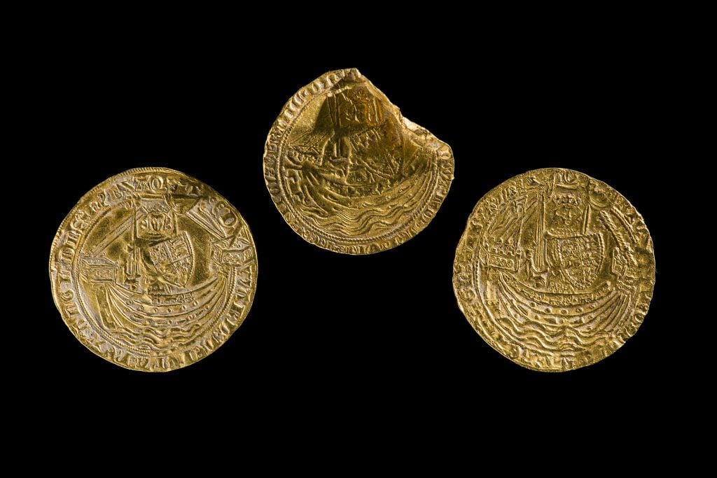 Medieval coin hoard: three gold coins of Edward III and Richard II.© Amgueddfa Cymru–National Museum Wales.