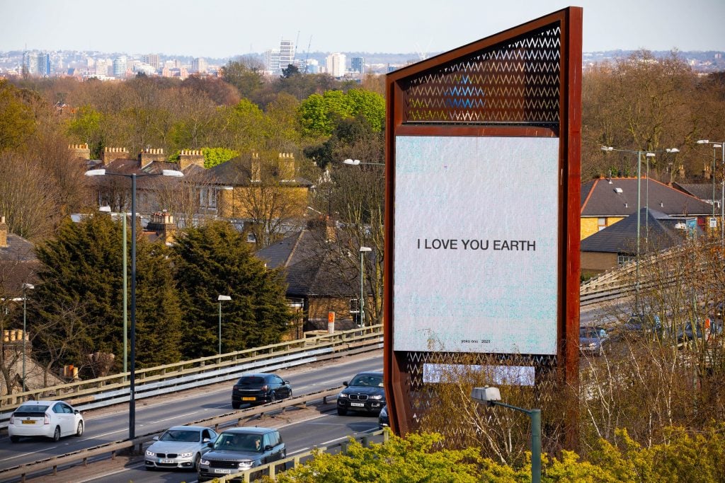 Yoko Ono's artwork <i>I LOVE YOU EARTH</i> is unveiled to mark Earth Day 2021 on the Chiswick Towers' digital billboards in West London by Serpentine, in partnership with ClearChannel. Photo by David Parry/PA Wire.