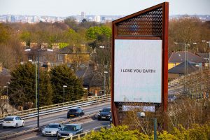 Yoko Ono's artwork I LOVE YOU EARTH is unveiled to mark Earth Day 2021 on the Chiswick Towers' digital billboards in West London by Serpentine, in partnership with ClearChannel. Photo by David Parry/PA Wire.