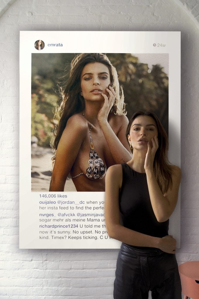 The NFT comes with an image of the model before a work depicting her by Richard Prince. Photo courtesy of Emily Ratajkowski and Christie's Images Ltd 2021.