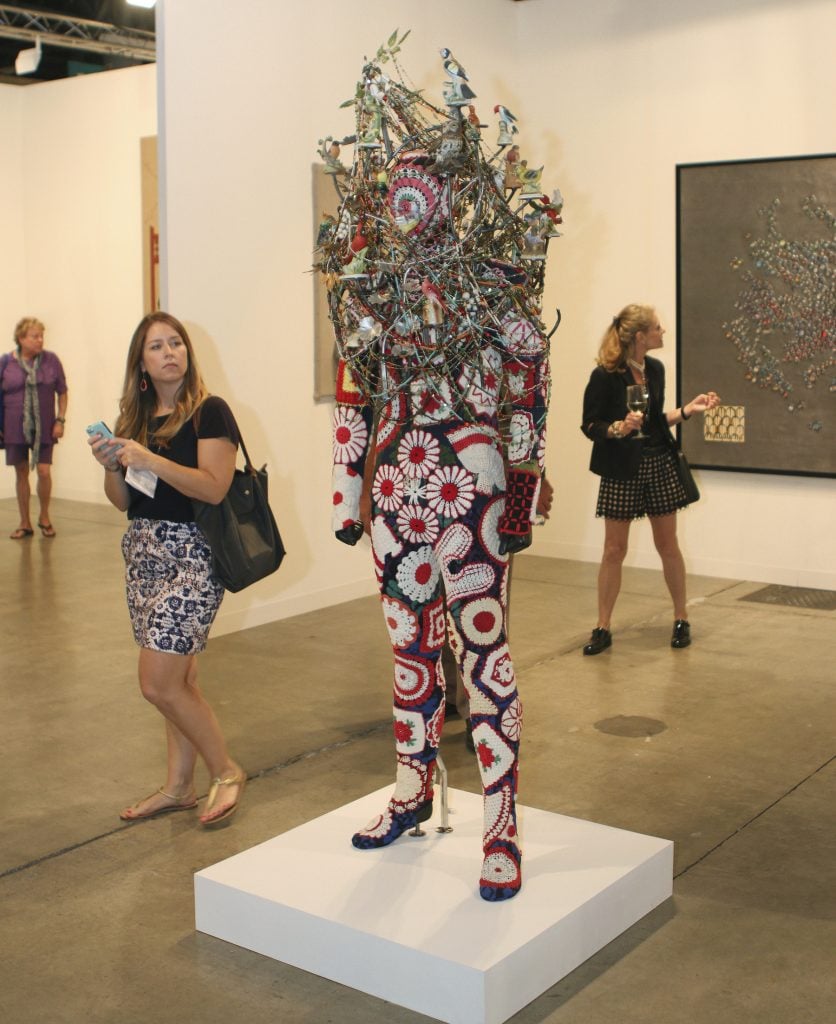 A Nick Cave Soundsuit sculpture shown during the Art Basel Miami Beach at Jack Shainman Gallery on December 3, 2014 in Miami Beach, United States. (Photo by Sean Drakes/LatinContent/Getty Images.)