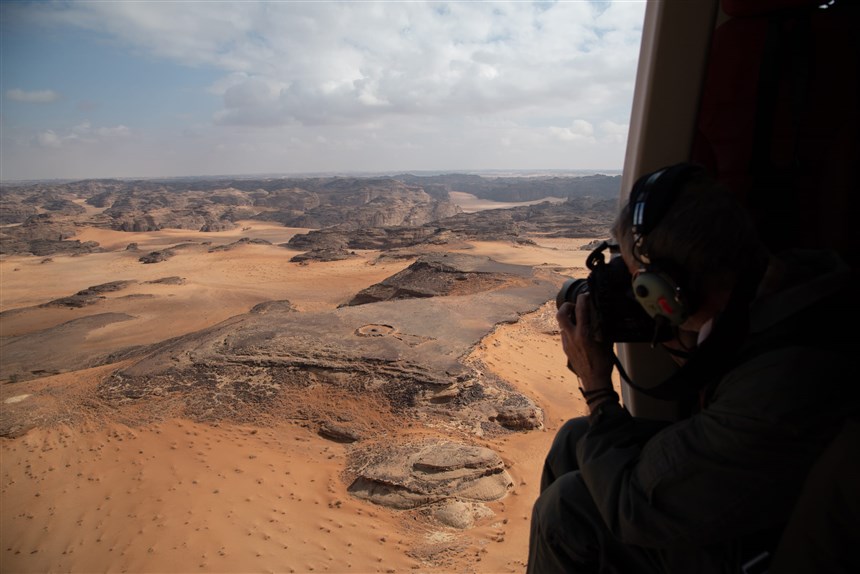 Surveying Mustatils by means of helicopter reconnaissance.  Photo © Air archeology in the Kingdom of Saudi Arabia and the Royal Commission for AlUla.