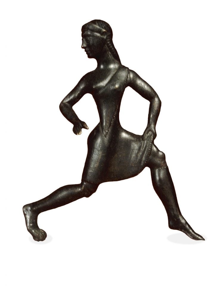 A bronze Archaic Greek figure of a running girl. © The Trustees of the British Museum.