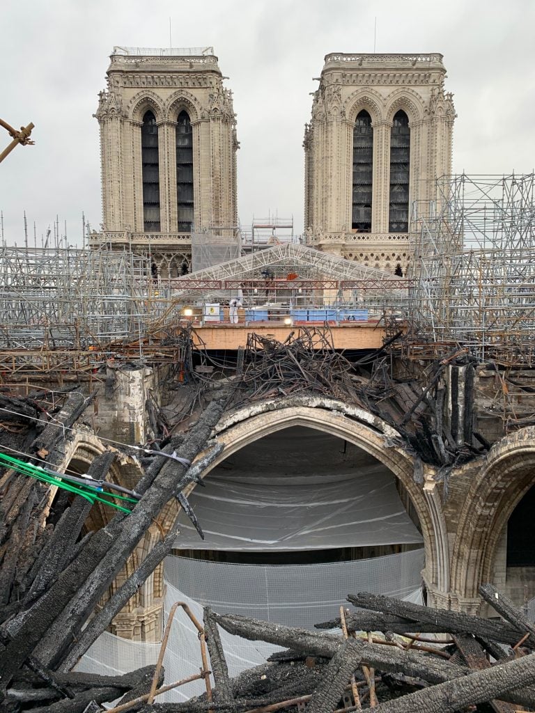 Removing scaffolding at Notre Dame Cathedral in Paris after the fire. Photo courtesy of Friends of Notre-Dame de Paris.