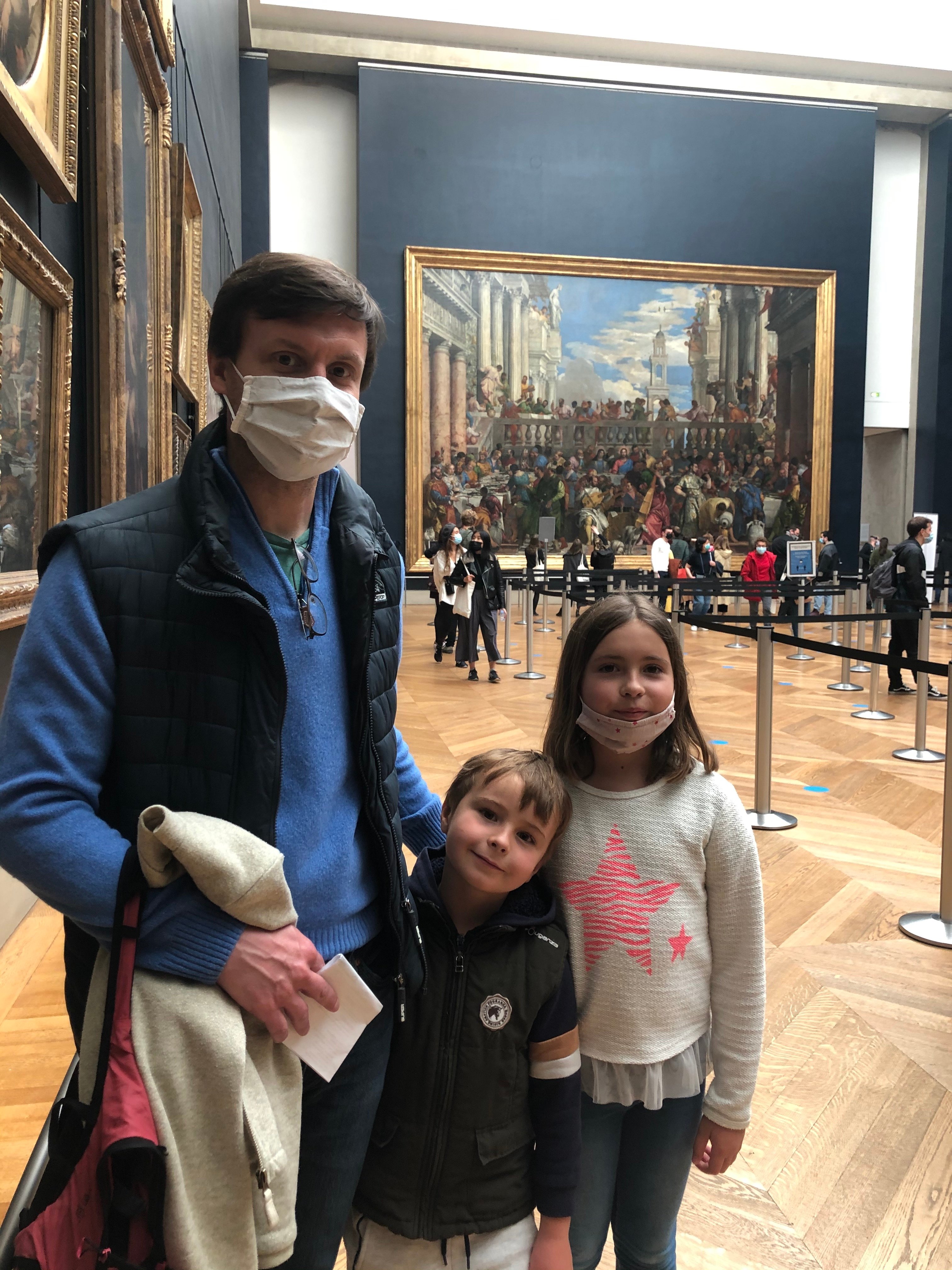 Benoît Kergo, Zoé, and Oscar at the Louvre's first day after reopening. Photo: Devorah Lauter.